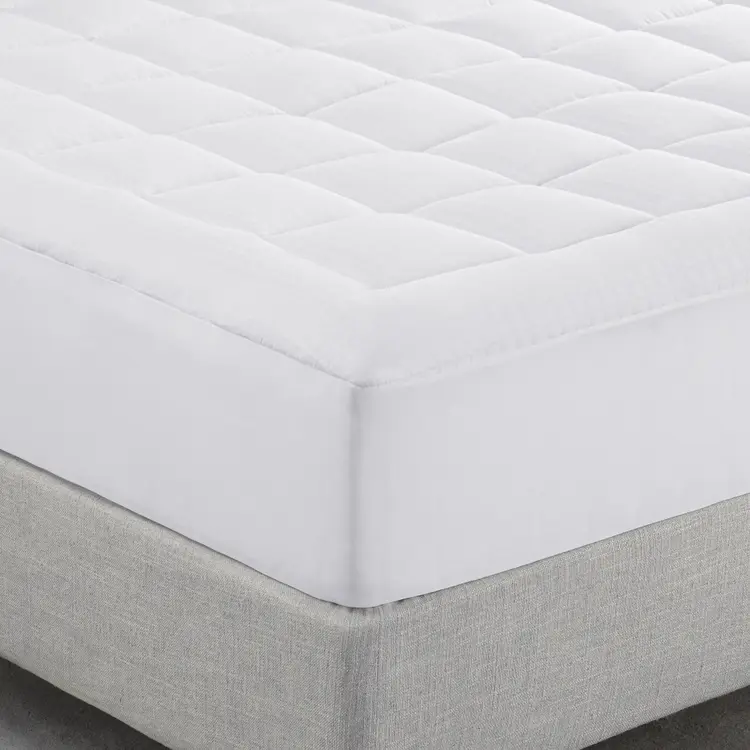 Close up corner of The Serta ComfortSure Mattress Pad on a mattress